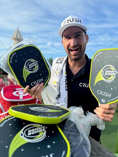 Benny with Crush pickleball paddles